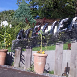Enseigne de l'atelier Enseigne à l'entrée de l'atelier